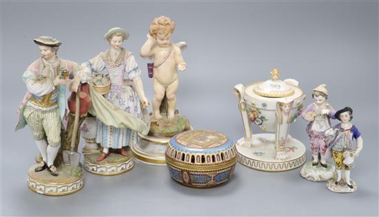 A pair of Meissen figures, a Meissen putti, two smaller Meissen figures, a lidded centrepiece and an Austrian style jar and cover, tall